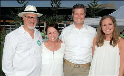  ??  ?? Heifer Internatio­nal Chief Executive Officer Pierre Ferrari with Lorri and Scott Hambuchen and their daughter, Grace Hambuchen