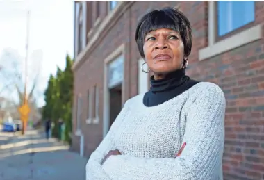  ?? MIKE DESISTI / MILWAUKEE JOURNAL SENTINEL ?? Belinda Pittman-McGee stands outside Nia Imani Family Inc., which she founded 22 years ago to provide transition­al housing to homeless women and their children. Photo galleries and videos at jsonline.com/timetoheal.