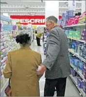  ?? Rene Johnston Toronto Star via Getty Images ?? AMERICANS Joe and Joyce Shannon traveled from North Carolina to shop for medication­s in Toronto.