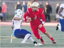  ?? JACQUES BOISSINOT/ THE CANADIAN PRESS ?? Rouge et Or QB Hugo Richard will lead Laval against the Dinos on Saturday at McMahon Stadium.