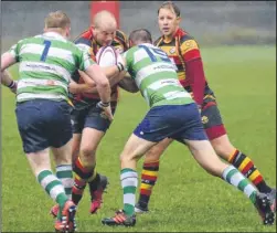  ?? Pictures: Paul Amos FM4506079, FM4506078 ?? Above, Ashford’s progress held up by Folkestone at Kinneys Field on Saturday. Right, Ashford get the ball out