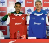  ??  ?? Bengaluru FC skipper Sunil Chhetri ( left) and head coach Albert Roca at an event in Bengaluru on Tuesday.