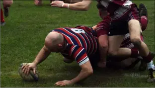  ?? ?? Victory: Barnsley RUFC’s Dave Reed scores a try against Burley.