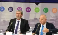  ?? (Avshalom Sassoni/Maariv) ?? EDUCATION MINISTER Rafi Peretz (left) and Education Ministry director-general Shmuel Abuhav address the media in Jerusalem yesterday.