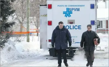  ?? JOHN KENNEY/ THE GAZETTE ?? Police investigat­ors leave a Dorval house Tuesday morning where a teenager was shot Monday night. The teen’s 12-year-old brother is in custody charged with manslaught­er and is to appear in court on Friday.