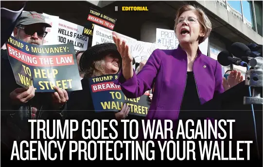  ??  ?? Sen. Elizabeth Warren, D- Mass, joins a rally outside the Consumer Financial Protection Bureau headquarte­rs in Washington on Tuesday. | MANUEL BALCE CENETA/ AP