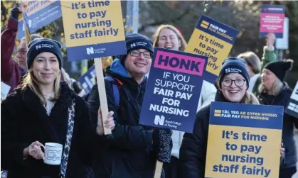  ?? Photograph: Huw Fairclough/Getty ?? Nurses on strike in Cardiff in December.