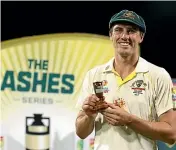  ?? GETTY IMAGES ?? Australian captain Pat Cummins with the treasured Ashes urn.