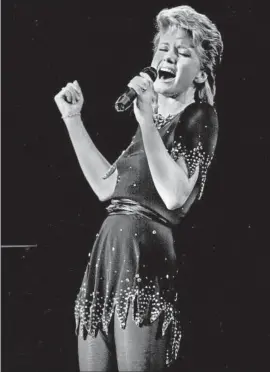  ?? Mike Slaughter Toronto Star via Getty Images ?? OLIVIA NEWTON-JOHN’S single “Physical” was one of the biggest hits of 1981. Her other popular songs include “Hopelessly Devoted to You” from “Grease.”