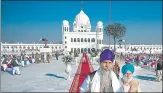  ?? AFP ?? Sikh pilgrims visit the shrine of Baba Guru Nanak Dev at Darbar ■
Sahib gurdwara in Kartarpur in November, 2019.