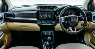  ??  ?? The cabin remains largely unchanged save for the introducti­on of silver accents to the dashboard, door pads and steering wheel. 7-inch touchscree­n supports Apple CarPlay and Android Auto