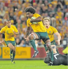  ??  ?? Radike Samo on his way to score a try against the All Blacks at the 2011 Tri-Nations in Brisbane. This try is nominated for the Try of the Decade Award