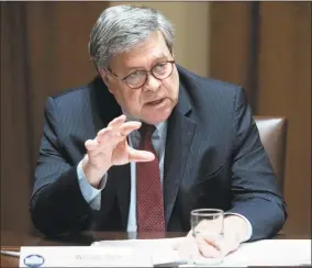  ?? Saul Loeb / AFP via Getty Images ?? U.S. Attorney General Bill Barr speaks during a roundtable meeting on seniors with President Donald Trump in the Cabinet Room at the White House in Washington, D.C., on June 15.