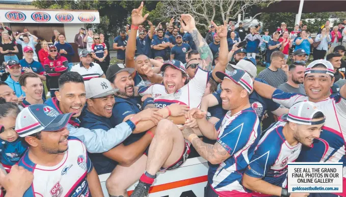  ?? Picture: GLENN HAMPSON ?? Fans hoist Runaway Bay captain Jamie Anderson after their fairytale win over Tweed Heads at Pizzey Park yesterday.