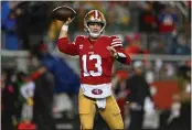 ?? JOSE CARLOS FAJARDO — BAY AREA NEWS GROUP ?? San Francisco 49ers quarterbac­k Brock Purdy (13) looks to throw the ball against the Green Bay Packers in the first quarter of their NFC divisional playoff game at Levi's Stadium in Santa Clara on Jan. 20.