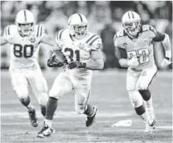  ?? KIRBY LEE, USA TODAY SPORTS ?? Colts running back Donald Brown rushed for 80 yards in comeback win vs. Titans.