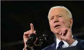  ?? GETTy imAgEs FiLE ?? ‘WE CAN GET IT DONE’: President Biden takes the wrapper off his $2 trillion infrastruc­ture plan Wednesday in Pittsburgh. At left, Gov. Charlie Baker speaks. Baker says major investment in climate programs is needed.