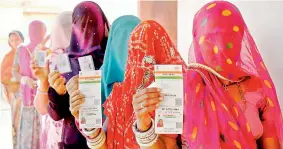  ?? — PTI ?? Activists claim 14 people starved to death in Jharkhand after being denied rations because they didn’t have Aadhaar cards.