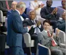  ?? ?? The Canadian Press
Prime Minister Justin Trudeau applauds Prince Charles after delivering remarks during the opening ceremony of the Commonweal­th Heads of Government Meeting in Kigali, Rwanda on Friday.