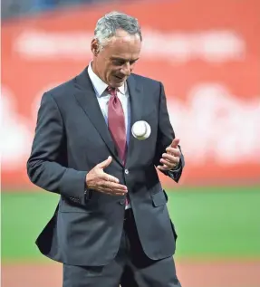  ?? DERIK HAMILTON/AP ?? Studies concluded there is less of a drag on the ball, but MLB Commission­er Rob Manfred said, “They could not conclude why that is.” A record 1,144 homers were hit in March and April, an increase of 12.2% from 2018.