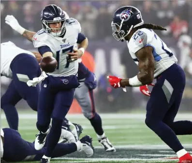  ?? File photo ?? After rushing for over 2,000 yards, Tennessee running back Derrick Henry, right, was named first-team All-Pro Friday. The Patriots had a pair of special teams standouts honored.