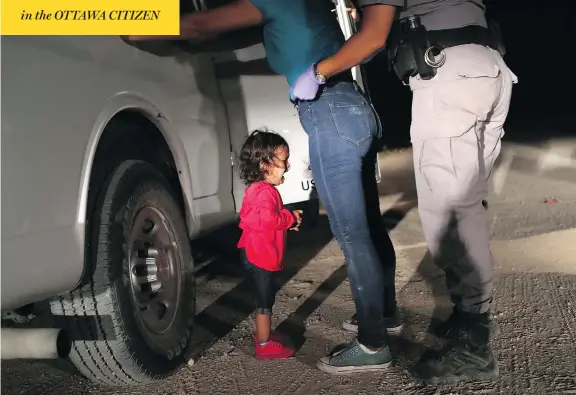  ?? JOHN MOORE / GETTY IMAGES ?? A two-year-old Honduran asylum seeker cries as her mother is searched and detained near the U.S.-Mexico border on Tuesday in McAllen, Texas.