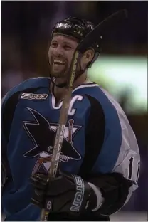  ?? ELSA — ALLSPORT ?? The Sharks’ Owen Nolan celebrates after San Jose beat the St. Louis Blues in Game 7of their first-round playoff series in 2000.