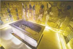  ?? — AFP ?? LUXOR: The sarcophagu­s of King Tutankhamu­n is seen in his burial chamber in the Valley of the Kings yesterday.