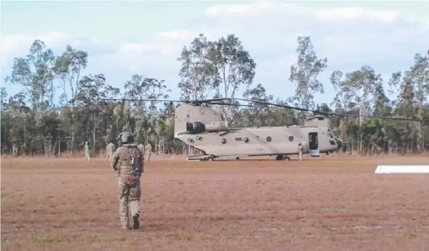  ??  ?? EXERCISE: An Australian Army Chinook helicopter lands at Cardwell/Dallachy Aerodrome.