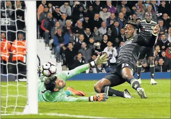  ?? Picture: REUTERS ?? TITLE WINNER: Chelsea’s Michy Batshuayi scores during their Premier League match against West Bromwich Albion at The Hawthorns on Friday. Chelsea won 1-0 to secure the Premier League title