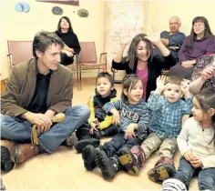  ?? JOHN LAPPA/SUDBURY STAR FILES ?? Justin Trudeau sits with children at the Anishnabek Daycare in Sudbury, Ont., in this file photo.