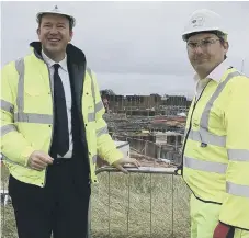  ??  ?? Transport Minister Jesse Norman (left) visits the A19 works compound in North Tyneside