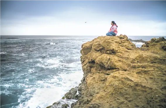  ?? Photos by Renan Ozturk ?? Hillary Renick sits at an ancestral Pomo tide pool at the Noyo Headlands. She says it used to surprise people that she sought out native culinary traditions.