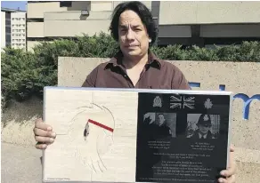  ?? JURIS GRANEY ?? Artist Wayne Ashley presented his gift to the Edmonton Police Service at a private ceremony Wednesday.