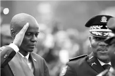  ??  ?? Moise salutes a National Police Official at the inaugurati­on in the National Palace of Portau-Prince. — Reuters photo