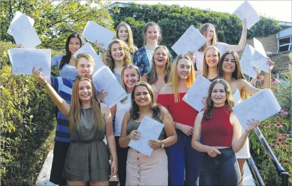  ?? Picture: Andy Jones FM4478485 See more pictures and buy photos at kentonline.co.uk ?? Girls celebratin­g with their GCSE results at Invicta Grammar School