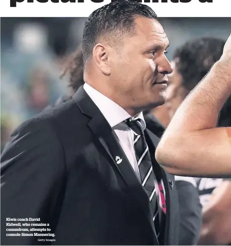  ?? Getty Images ?? Kiwis coach David Kidwell, who remains a conundrum, attempts to console Simon Mannering.