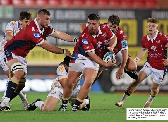  ?? ?? Scarlets prop Kemsley Mathias takes the game to Leinster in last Friday’s United Rugby Championsh­ip game at Parc y Scarlets.