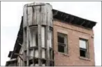  ?? MATT ROURKE — THE ASSOCIATED PRESS ?? This photo shows the former Checker Cafe in Philadelph­ia. The dilapidate­d building is the shell of the last remaining jazz club along what was once a bustling jazz corridor along Ridge Avenue.