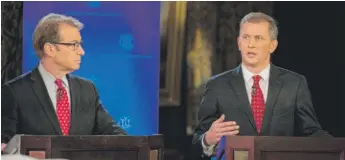  ?? SUN-TIMES FILE PHOTO ?? Sean Casten (right) debates U.S. Rep. Peter Roskam, R-Ill., at the Union League Club in July.