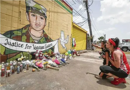  ?? Steve Gonzales / Staff photograph­er ?? Dawn Gomez is overcome with emotion Thursday as her 3-year-old granddaugh­ter, Saryia Greer, waves at a mural painted on the side of Taqueria Del Sol in Houston to honor the memory of deceased solider Vanessa Guillén.