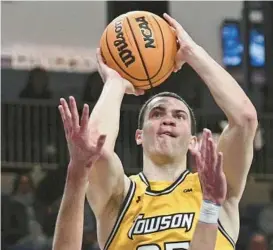  ?? KENNETH K. LAM/BALTIMORE SUN ?? Towson’s Nicolas Timberlake, pictured against Delaware in March, scored a game-high 17 points to help the Tigers overcome an early deficit and beat Hofstra 68-47 at home on Monday afternoon.