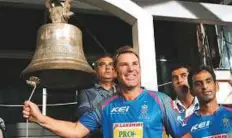  ??  ?? From left: Shane Warne of Rajasthan Royals ringing the opening bell before the start of the match against Kolkata Knight Riders at Eden Gardens yesterday. Rajasthan opener Jos Butler once again continued to find his sublime touch to score 39, including...