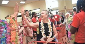  ??  ?? Trader Joe’s officially opened on Friday morning, drawing hundreds to the Germantown store’s unveiling. STAN CARROLL / THE COMMERCIAL APPEAL