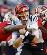  ?? JOSIE LEPE/ASSOCIATED PRESS ?? Joe Burrow survived crunch time against the 49ers to throw for three touchdowns in the Bengals’ win.