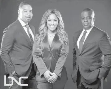  ?? BNC ?? Morning show anchors Mike Hill, left, and Sharon Reed are pictured with Black News Channel President and CEO Princell Hair.