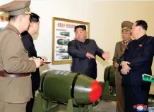  ?? Photo: Contribute­d ?? Testing… North Korean leader Kim Jong Un inspects a nuclear weapons project.
