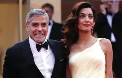  ?? PICTURE: AP ?? EXPECTING: Film star George Clooney with his wife barrister Amal.