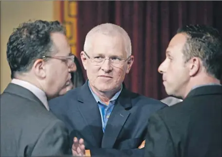  ?? Al Seib Los Angeles Times ?? LOS ANGELES City Council members Mike Bonin, center, Bob Blumenfiel­d, left, and Mitchell Englander, right, during a council meeting in April. “If you lay down with dogs, you’re going to get f leas,” Bonin said Tuesday of partnering with the Trump administra­tion.