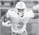  ?? STEPHEN M. DOWELL/ORLANDO SENTINEL ?? Jones Tigers running back Da’Quan Harris, shown against Oak Ridge in September, tied the game on a 29-yard run on Friday at Pine Forest.